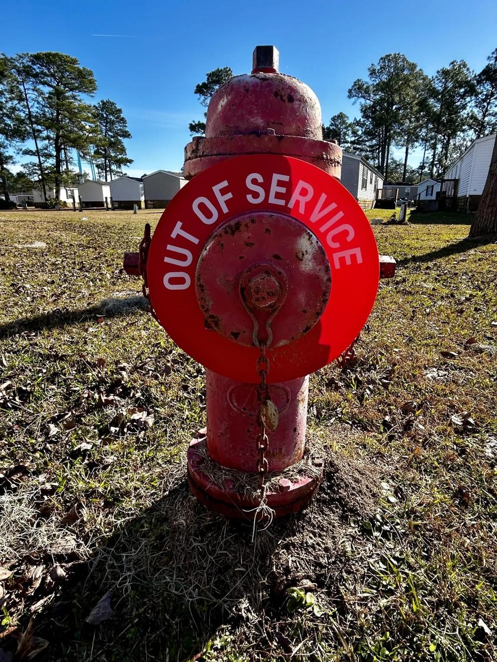 Two fire hydrants at Cypress Bend Mobile Home Park were clearly labeled as being out of service on Dec. 21, 2023. Credit: Robin Kemp/The Current GA