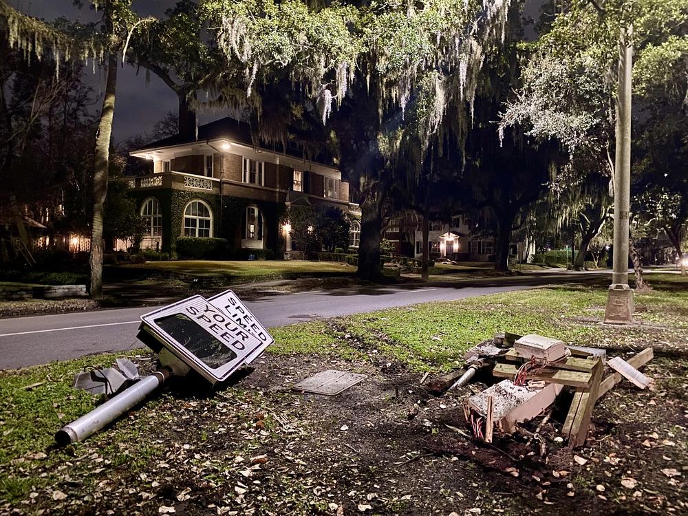 A downed speed monitor lies along Abercorn Street in Savannah's Ardsley Park neighborhood.