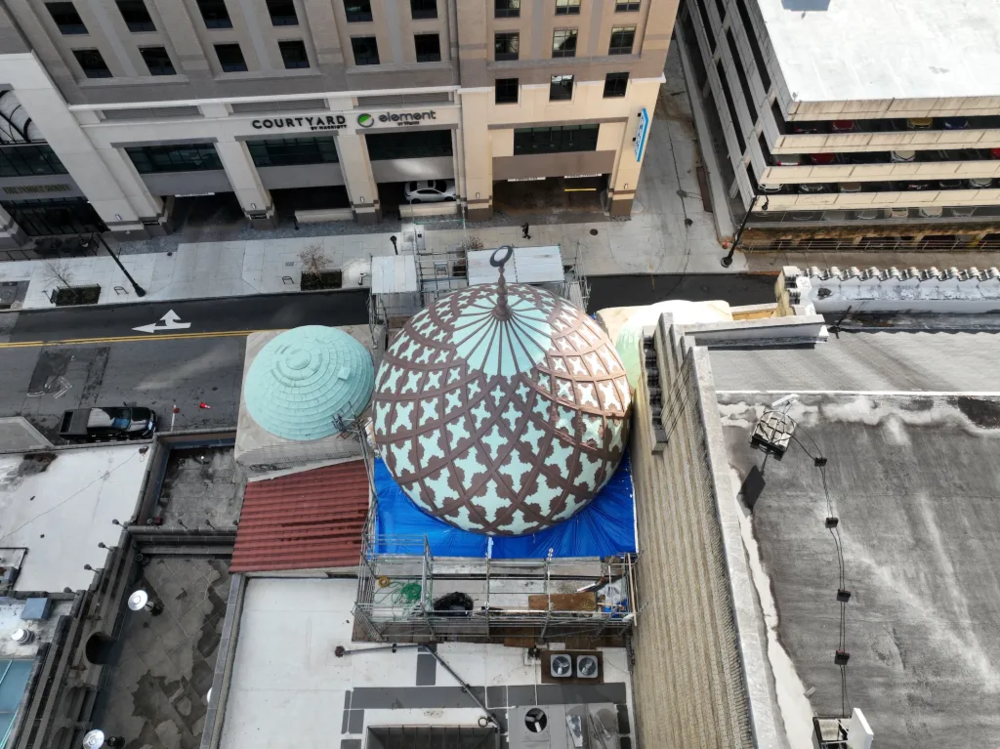 The nearly century-old Onion Dome atop the Fox Theatre undergoing renovation in 2023.