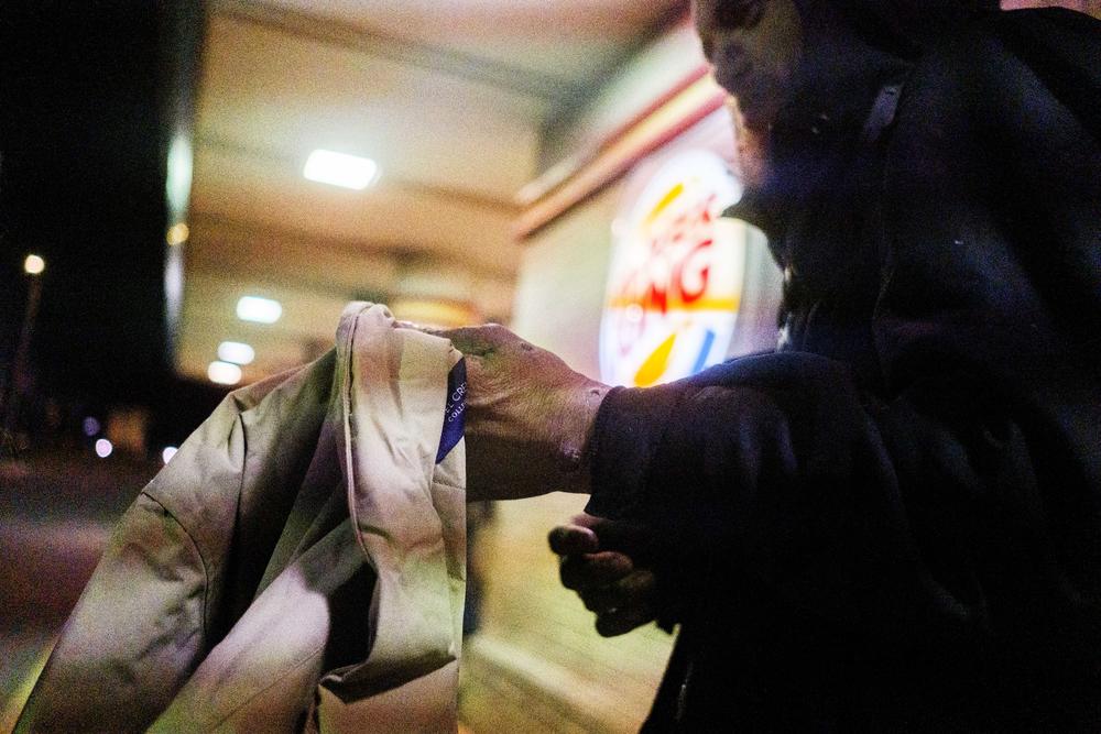 A young man with the jacket June O'Neal gave him. He declined her offer for shelter even in 20 degree cold. 