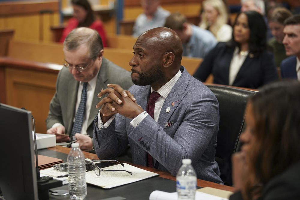 Special prosecutor Nathan Wade listens during a motions hearing for former President Donald Trump's election interference case, Friday, Jan. 12, 2024 in Atlanta. 