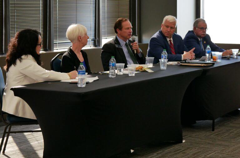 Rome Republican state Sen. Chuck Hufstetler (center) talks about expanding Medicaid coverage at an event in Atlanta Tuesday. 