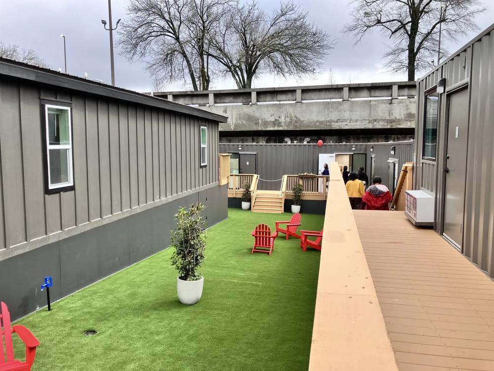 Atlanta’s first rapid housing community for those experiencing homelessness includes 40 micro-units made from repurposed shipping containers and a little artificial yard space.