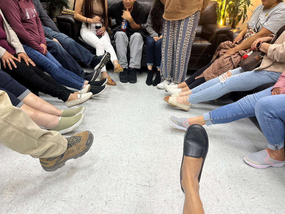A small group gathers in a room in an office inside a Dalton, G eorgia, grocery store in mid - November to discuss mental health and suicide among this community’s large Latin o population. The suicide rate among Latinos has increased significantly in the U.S. over the past decade. 