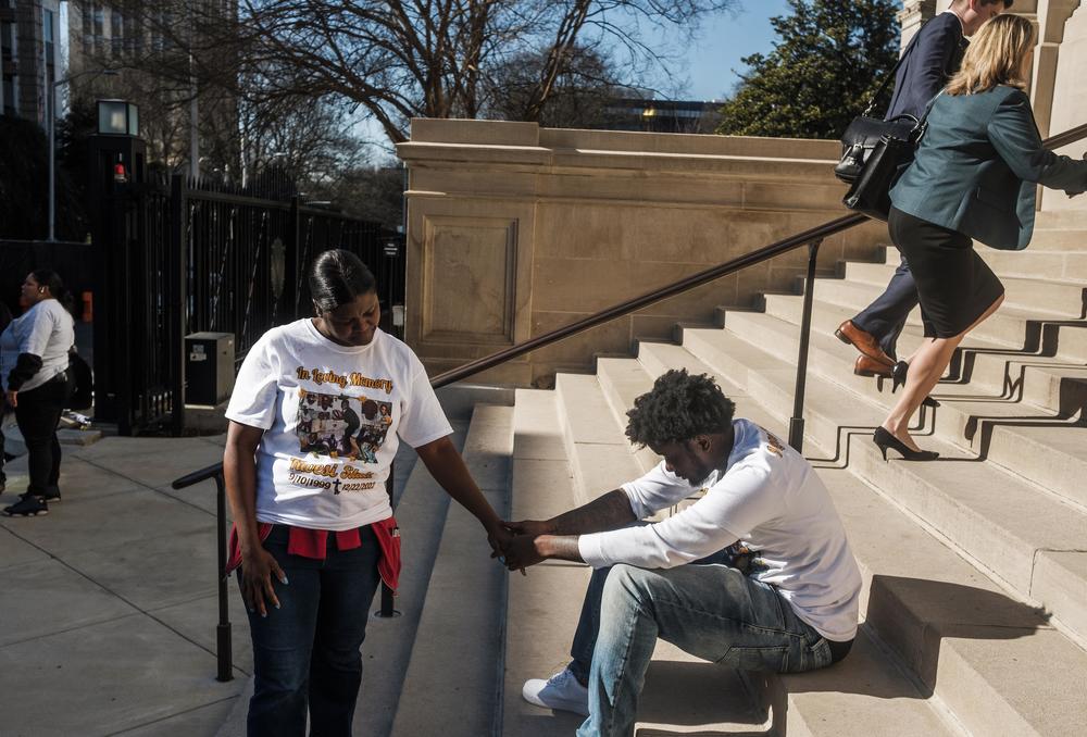 Family members of Kwesi Stultz after their trip through the capitol. Stultz was killed at Telfair State Prison three days before Christmas last year. 