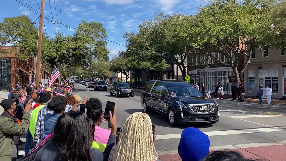 A hearse carrying the remains of Sgt. Breonna Moffett drives down Martin Luther King Jr. Boulevard in downtown Savannah on Thursday, Feb. 15, as onlookers honored the fallen soldier who was killed by a January drone attack in Jordan.