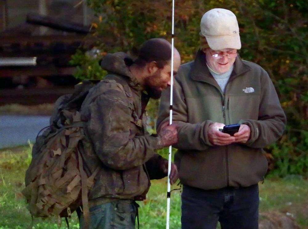 Charles Jeffries, Community Data Manager at the United Way of the Chattahoochee Valley, right, surveys a man experiencing homelessness during the 2024 Point in Time Count.
