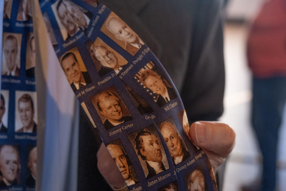 Presidential historian Larry Cook points out former President Jimmy Carter on his tie on Presidents Day 2024. 