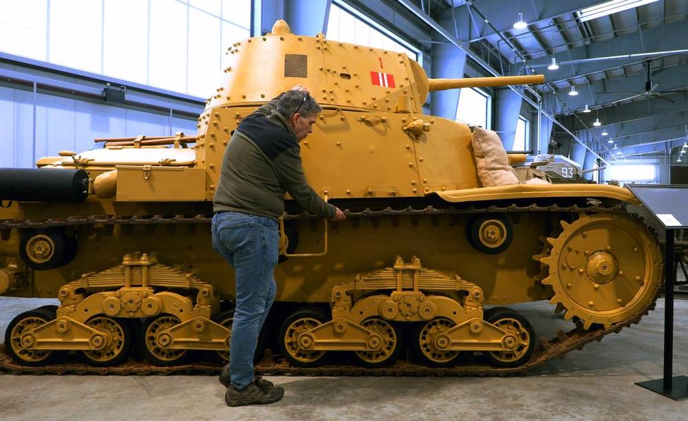 Robert Barlow, museum specialist and restoration shop manager with the U.S. Army Armor and Cavalry Collection at Ft. Moore, Georgia, talks about the restoration of this M 14/41 Italian tank, also called the Carro Armato M 14/41. 02/01/2024 Mike Haskey mhaskey@ledger-enquirer.com  