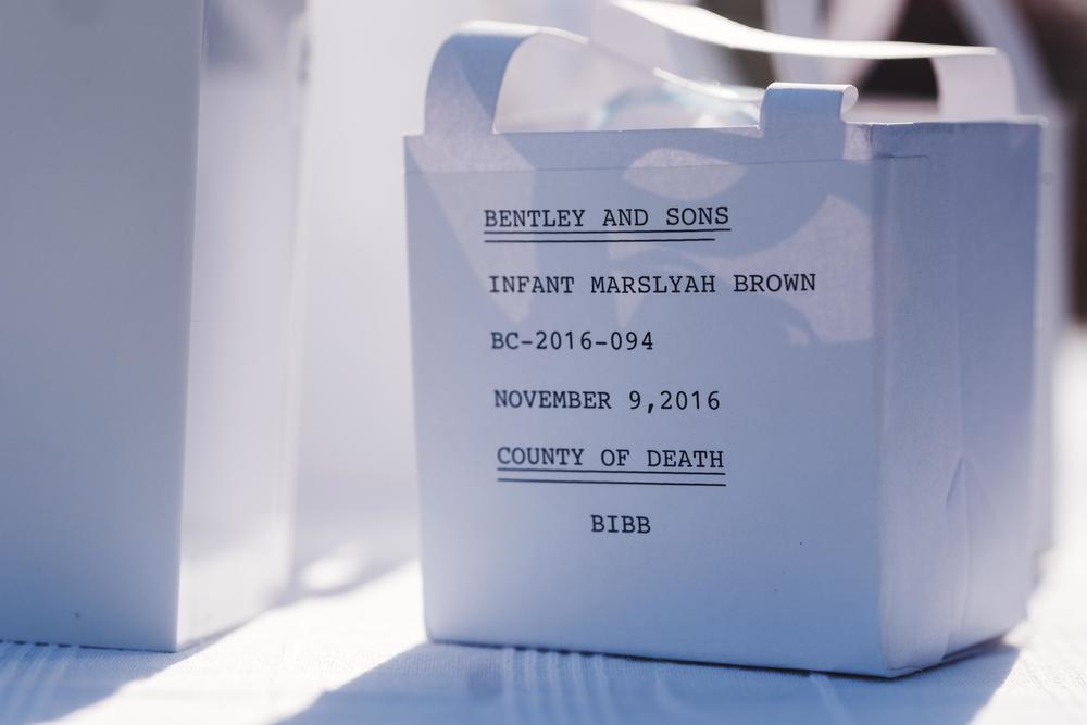A small box containing the remains of infant Marslyah Brown.