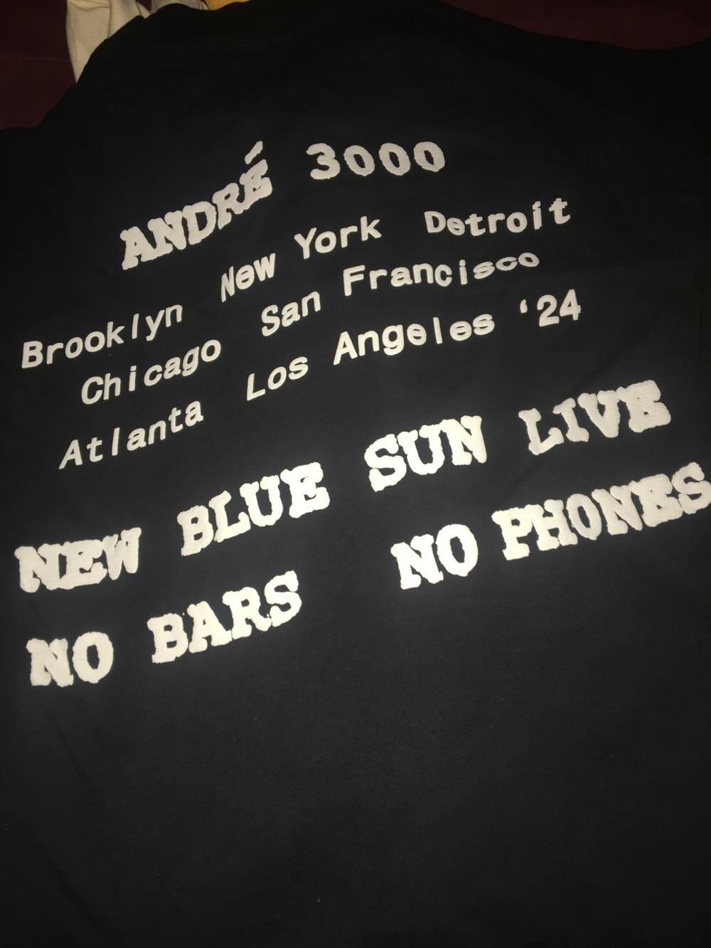A T-shirt for sale at an Andre 3000 concert