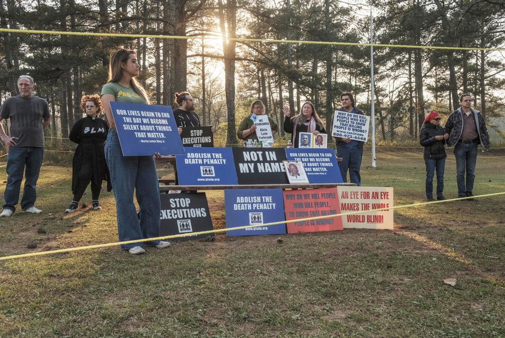A small group of death penalty opponents gathered outside Georgia Diagnostic Prison in Jackson to protest the execution of Willie Pye on Wednesday, March 20, 2024. 