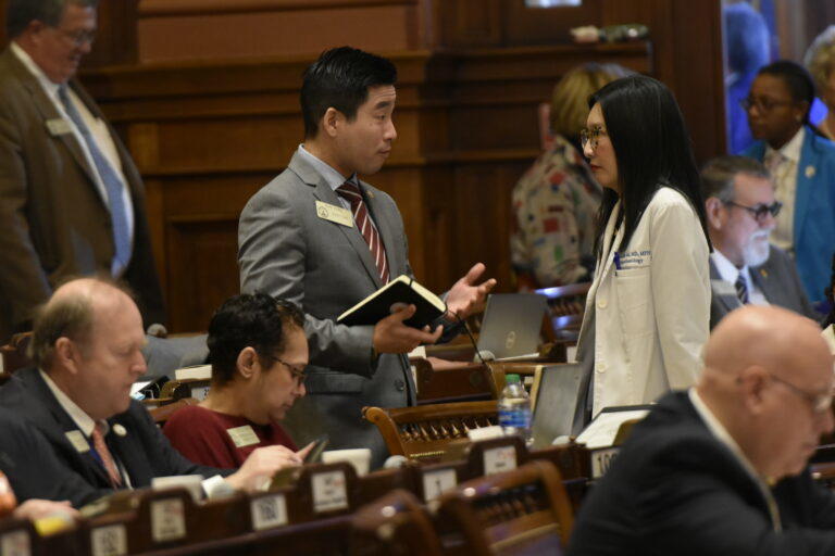 Reps. Sam Park and Michelle Au.