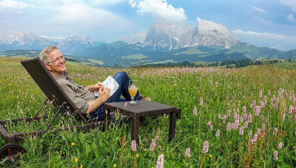 Rick Steves relaxing in Italy's Dolomites.