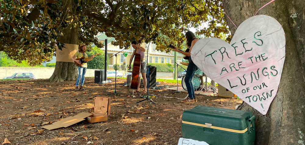 Athens residents protested in 2021 when some came to believe that the 120-year-old magnolias outside The Varsity would be removed. Credit: Blake Aued