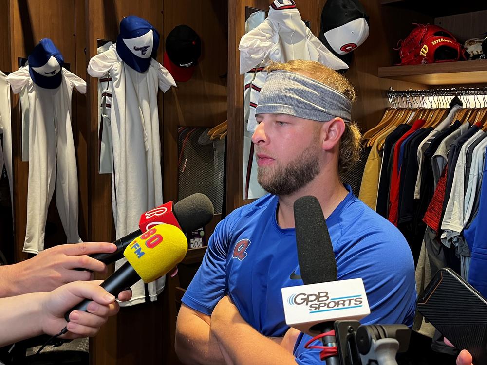 A.J. Minter speaks to reporters after the Braves' loss to the New York Mets on Monday, April 8, 2024.