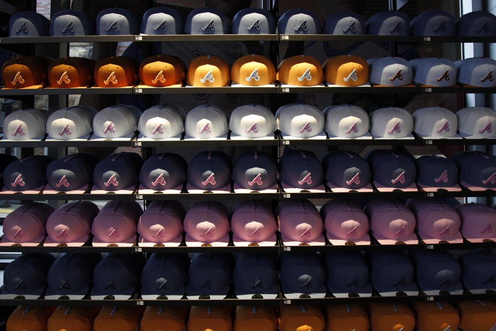 The “hat wall” at the Braves Clubhouse store at Truist Park. 