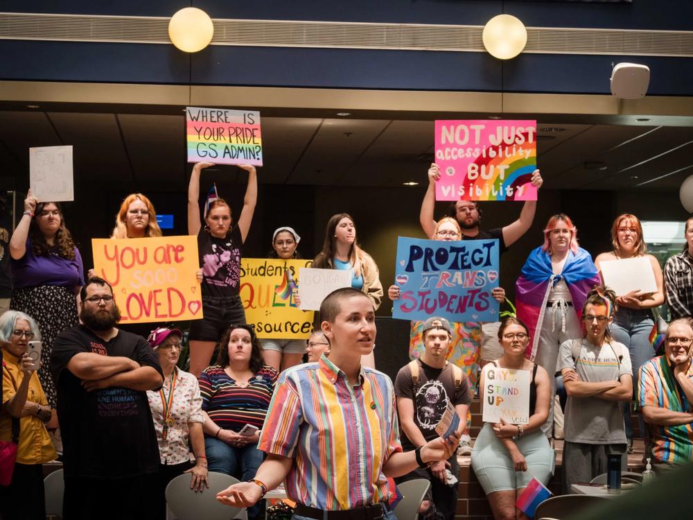 Ellen Murphy, a representative for the Georgia Southern University students, reads a list of demands in protest the institution abruptly discontinuing programs designed to lessen discrimination against LGBTQIA+ people. April 29, 2024, in Statesboro, GA. 