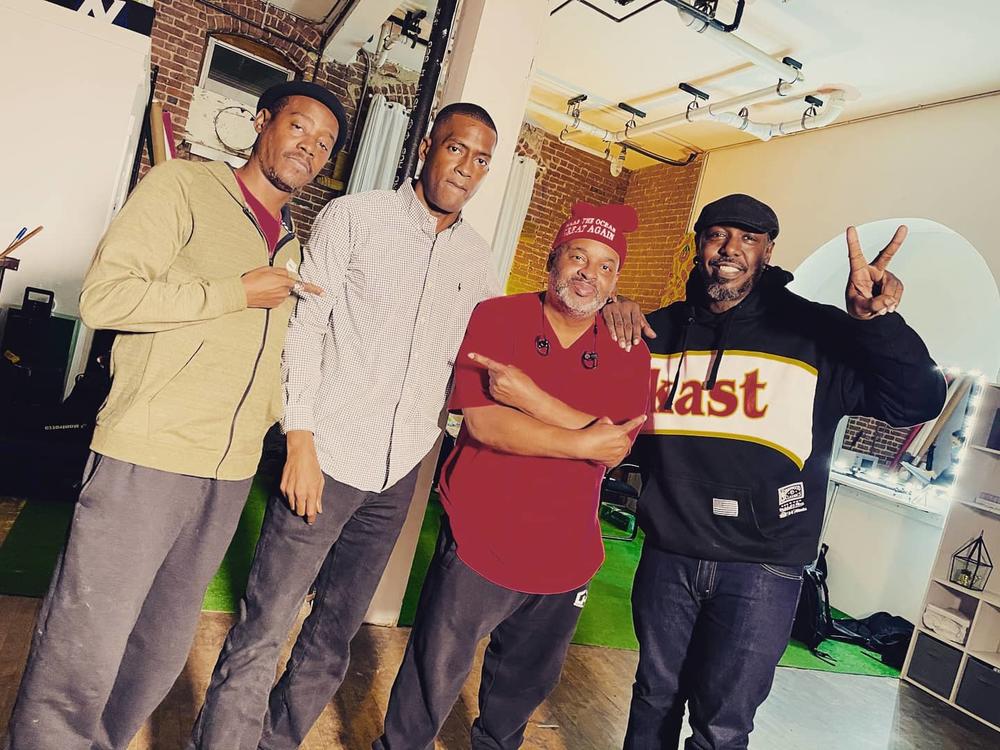 Ray Murray, Rico Wade, Ian Burke and Pat "Sleepy" Brown on the set of a film about Burke. (Burke returned the favor as a cont