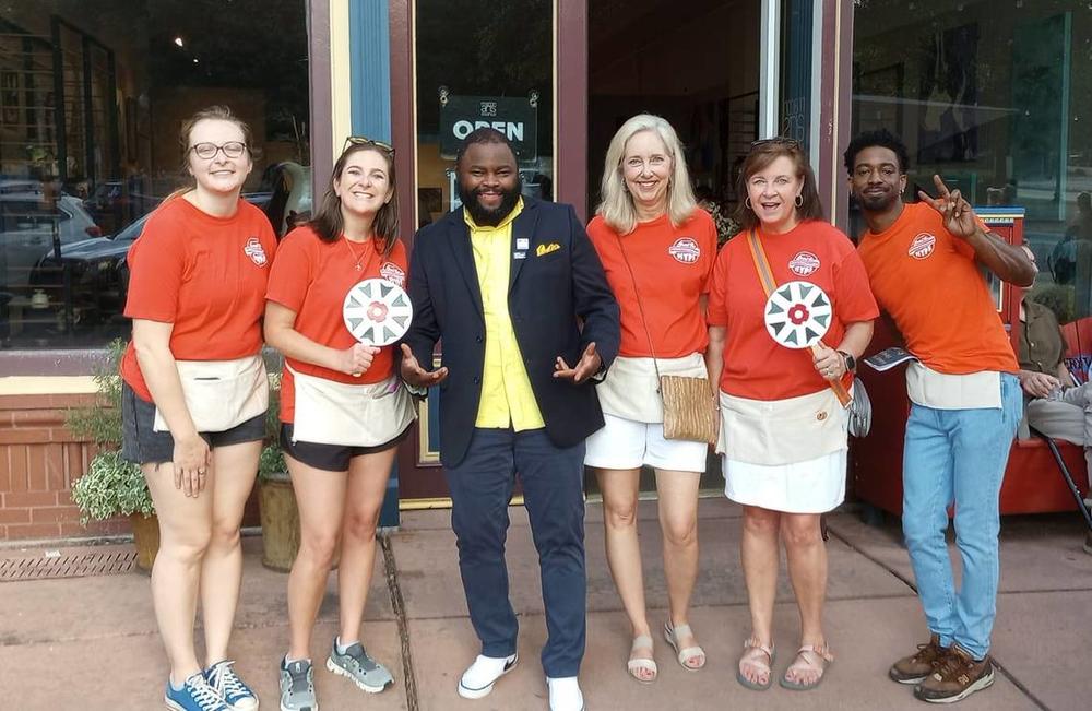 Downtown Macon Hype Team, from left, Rachel Molnar, Hollis Ann Gandy, DSTO Moore, Julie Yates, Laura Bechtel, Corey Wimberly smile for a photo.