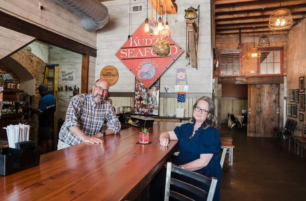 Lee and Kelley Clack received a business loan from NewTown to expand Kudzu Seafood Company from their Third Street location in the Dannenberg to their current location on Poplar Street.