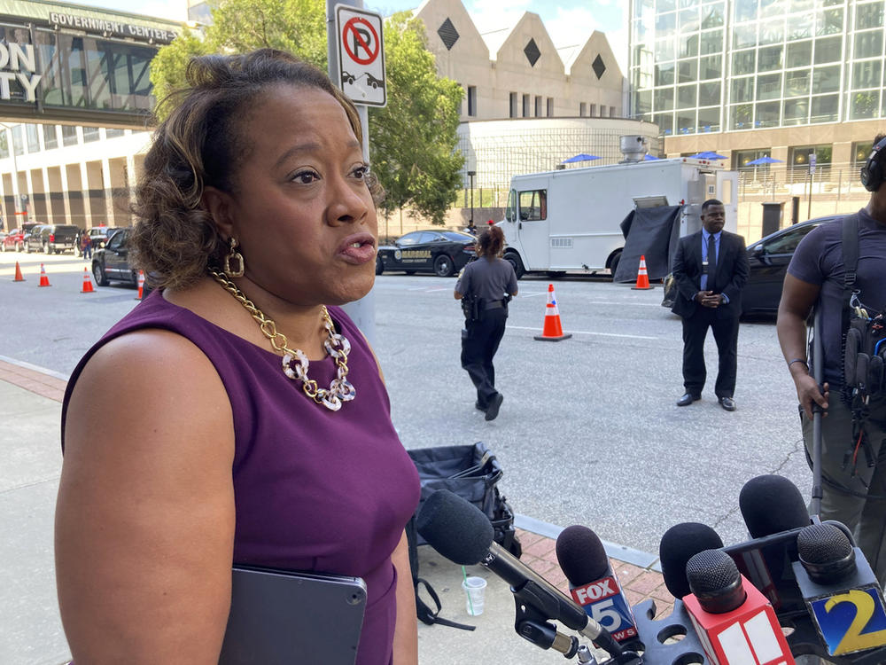 DeKalb County District Attorney Sherry Boston speaks to reporters Friday, Sept. 22, 2023, outside the Fulton County Courthouse in Atlanta. Boston is one of four Georgia district attorneys who sued to overturn a law that lets a new commission to discipline and remove prosecutors. A Fulton County judge heard arguments over whether she should freeze the law.