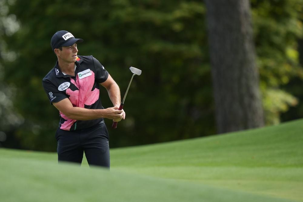 Viktor Hovland, of Norway, watches his putt on the eighth hole during the first round at the Masters golf tournament at Augusta National Golf Club Thursday, April 11, 2024, in Augusta, Ga.