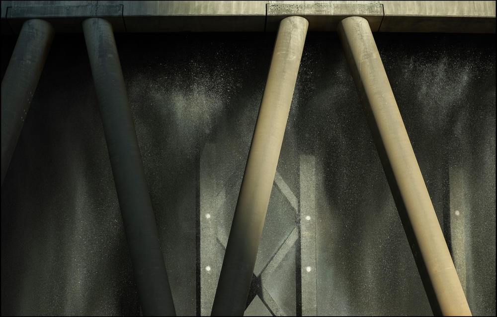 Water cascades to the bottom of the cooling tower of one of the new Plant Vogtle units. 