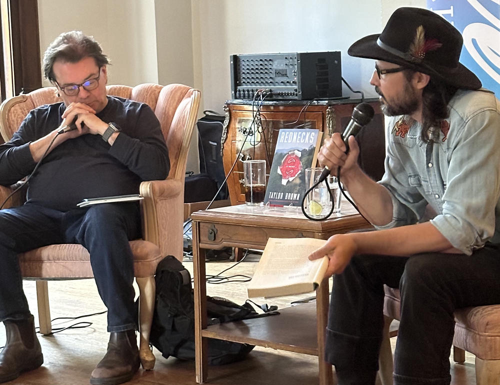 Author Taylor Brown (right) talks to Chuck Reece about his novel "Rednecks"