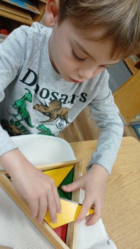 Mireloi Reis' son Aysha is shown playing with blocks at Creative Labs Learning Center in Alpharetta, Ga.