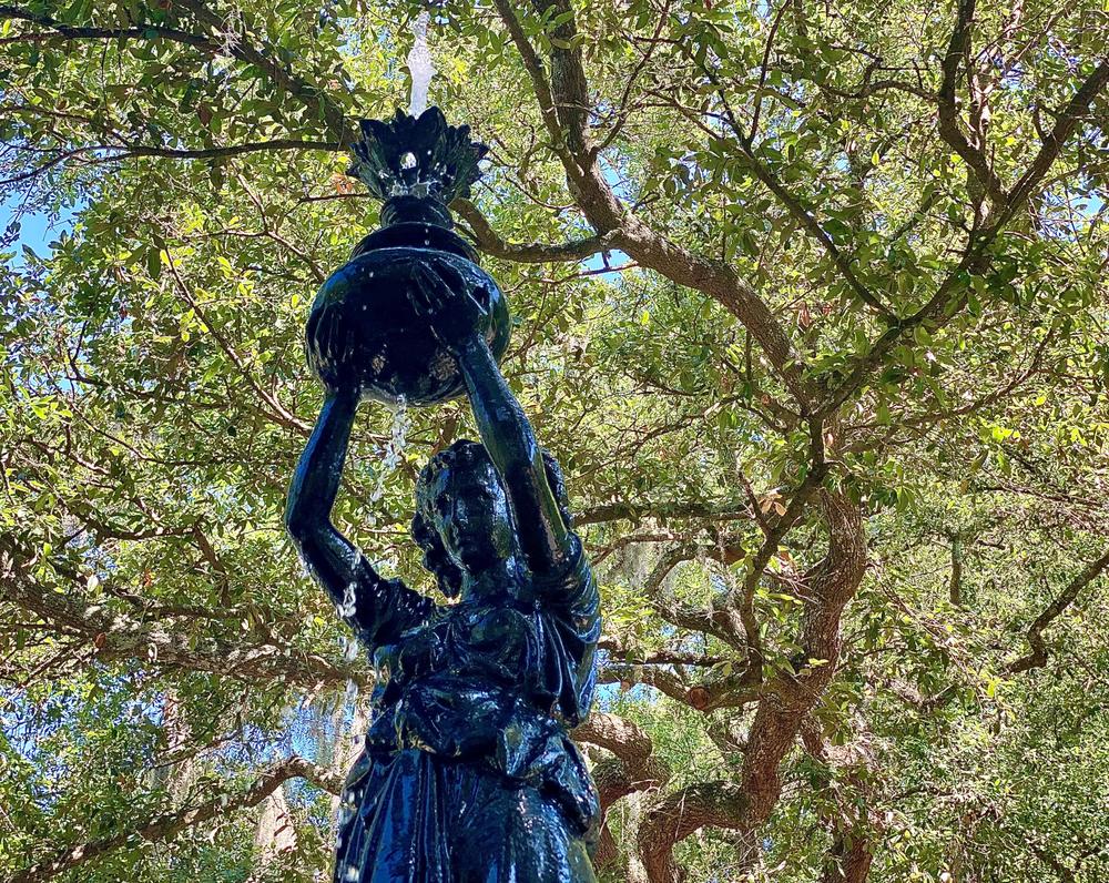 A sculpture representing Flora — the goddess of flowers and flowering plants — serves as the fountain's focal point.