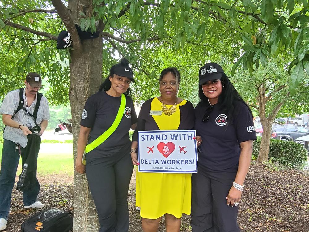 IAM Human Rights Director Nicole Fears, Georgia Representative Kim Schofield, and Delta ramp worker Amanda Goodmanberry attended the rally demanding Delta allow workers to organize and vote on a union without interference.
