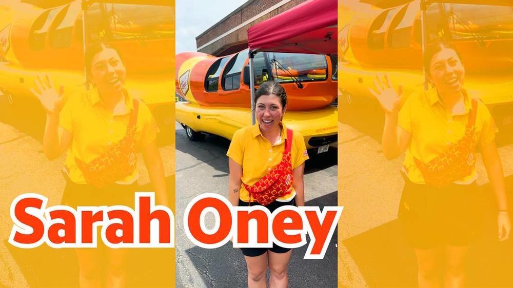 Sarah Oney is a “Hotdogger” on the Oscar Mayer Wienermobile. Photo from video provided by Stephen Harrison