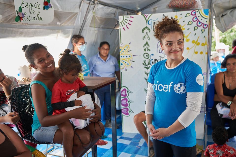 UNICEF Ambassador Laurie Hernandez visits a safe space for those who have experienced trauma while migrating through the Darién Gap. In this space, UNICEF provides psychosocial resources and support. Courtesy of UNICEF
