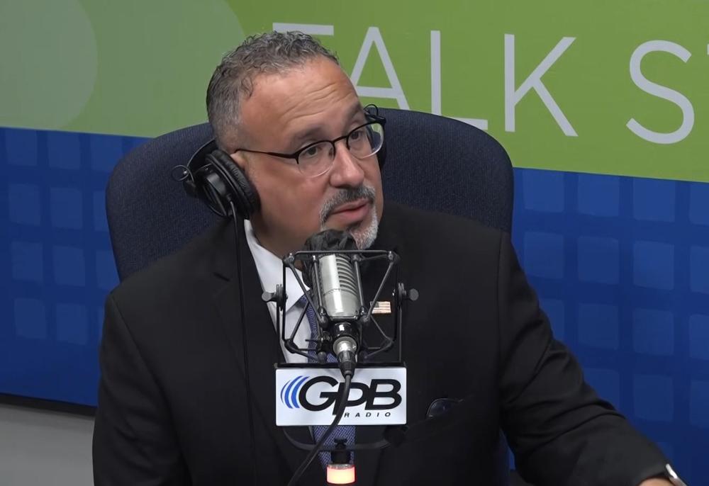 U.S. Secretary of Education Miguel Cardona speaks with GPB's Peter Biello at GPB's Atlanta studios on July 17, 2024.
