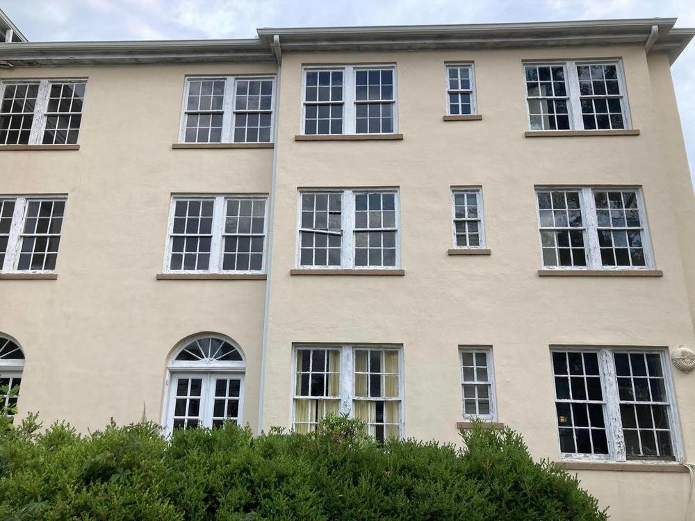 The exterior of the New Perry Hotel shows signs of wear and tear. The new owners say its structural integrity has “significantly deteriorated over time” with cracks in the foundation, water damage and compromised load bearing elements. (Becky Purser/The Telegraph)