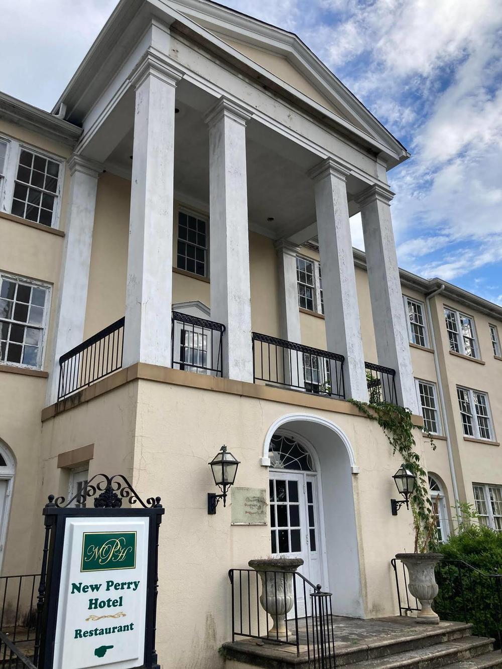 A certificate of appropriateness has been approved for the demolition of the New Perry Hotel and Motel. The three-story hotel was built in 1925. The one-story motel behind it was added in 1955. (Becky Purser/The Telegraph)