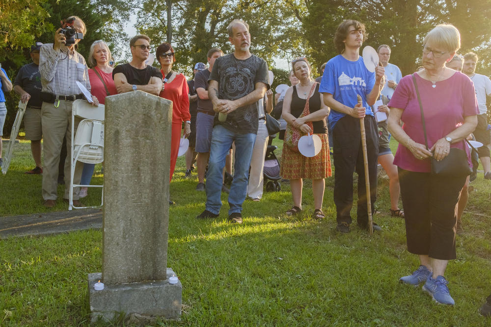 Participants in the recent tour of the Oak Ridge Cemetery in Macon pause at the grave of Eady Beecher, born into slavey in 1799 in Virginia but who died free at the age of 103 in Macon. The gravestone records the year of 1811 she was sold to an S.T.  Beecher of Milledgeville in 1811. That may have been engraved by Eady’s descendants  who knew he was their ancestor, too. 