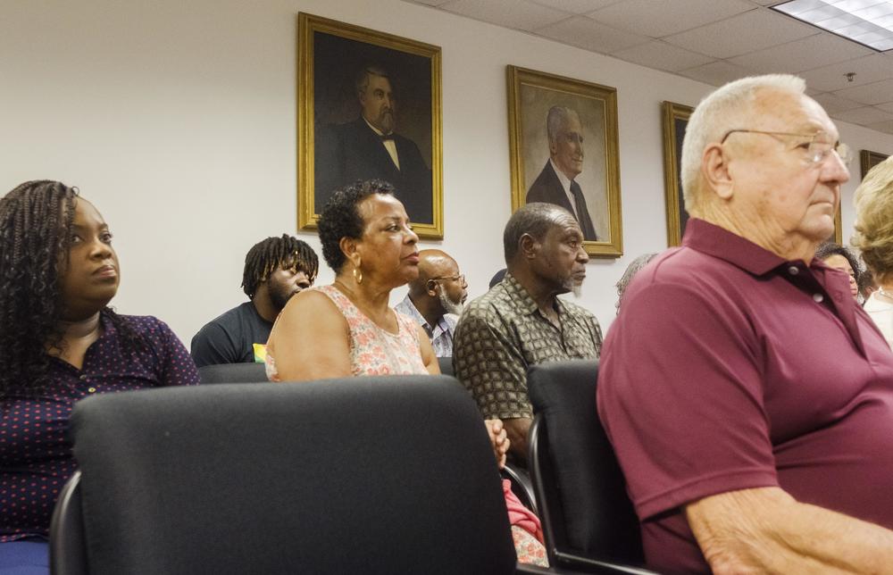 Residents of Sparta who stand to either lose part of their property to the Hanson Spur, or who fear losing part of their piece of mind from it, listen during the start of the final hearing before the Georgia Public Service Commission about the proposed use of eminent domain for the project. 