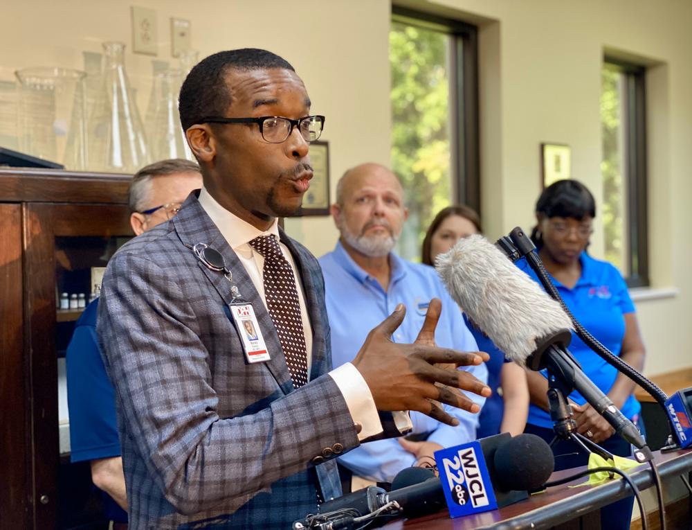 Coastal Health District director Dr. Bonzo Reddick speaks at a news conference at the Chatham County Health Department in Savannah on Friday about public health risks in the wake of Tropical Storm Debby.