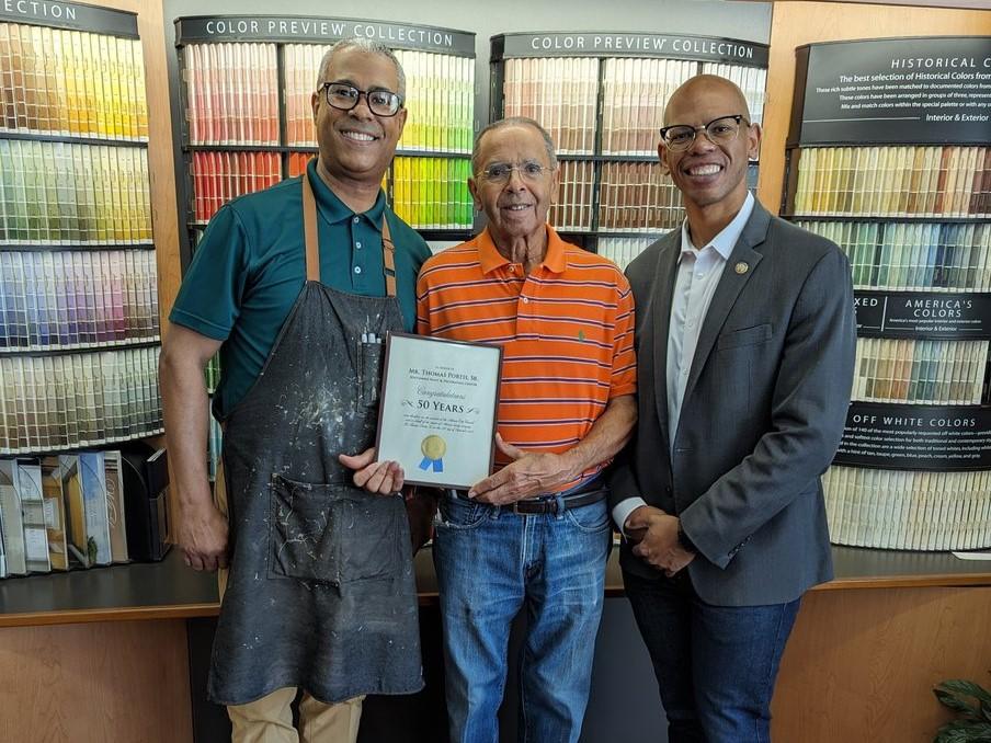 Atlanta City Councilmember Jason Dozier met with the Portis family to celebrate 50 years of their family business operating in Atlanta's West End Neighborhood.