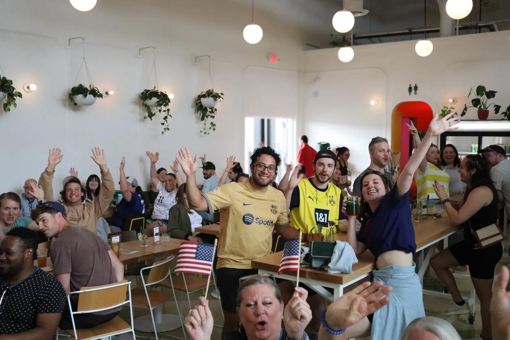 People gather at a Jolene Jolene event to watch USA women’s volleyball during the 2024 Olympic games. (Provided by Jolene Jolene)