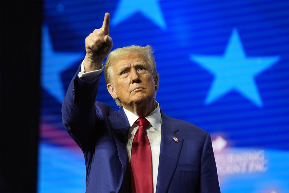 Republican presidential nominee former President Donald Trump gestures at a campaign rally Wednesday, Oct. 23, 2024, in Duluth, Ga.