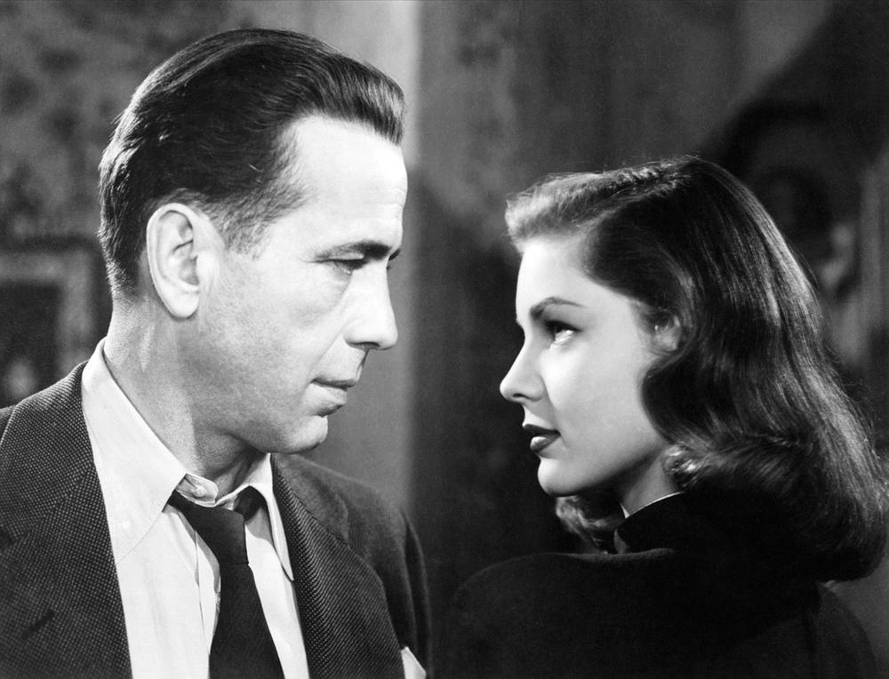 Humphrey Bogart and Lauren Bacall in "The Big Sleep", one of the earliest examples of film noir.