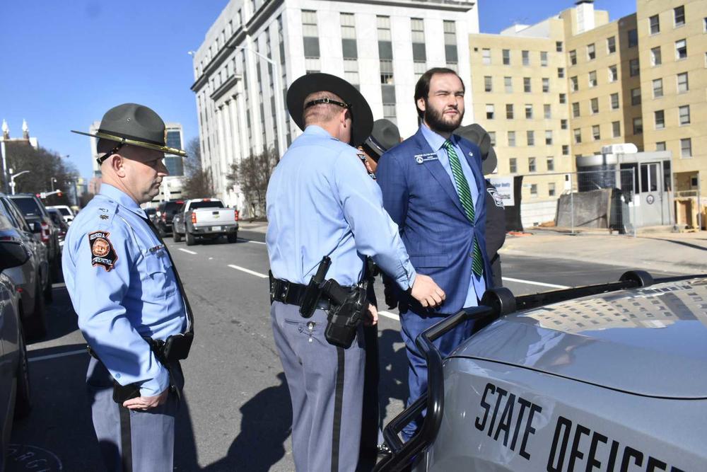  Georgia state Sen. Colton Moore is arrested outside the Capitol soon after he deliberately violated a ban barring him from entering the House chambers. Ross Williams/Georgia Recorder