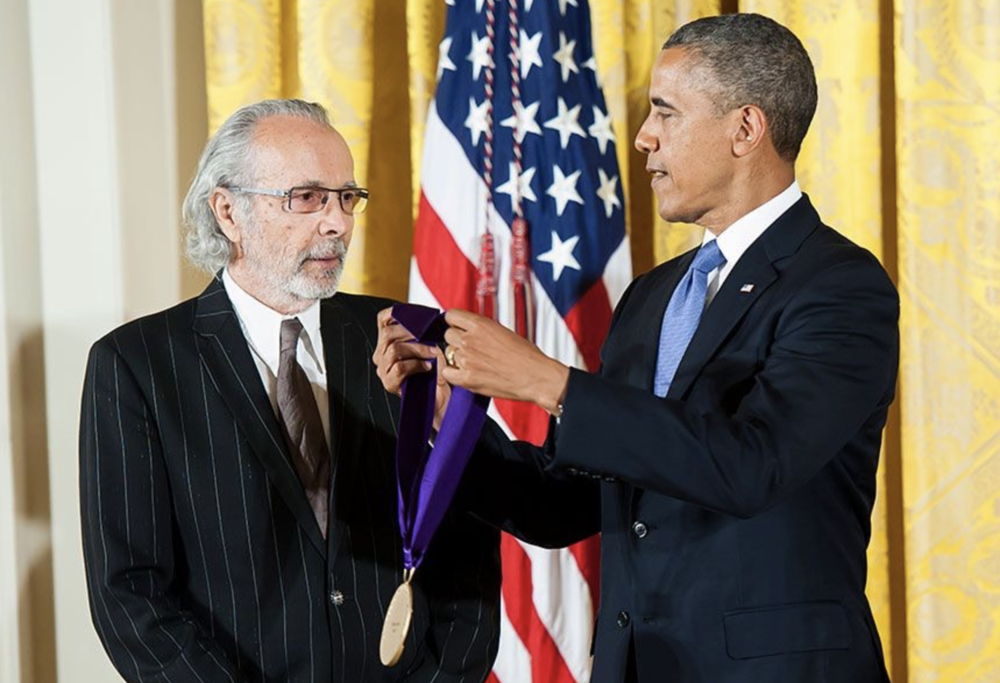 President Barack Obama awards the 2012 National Medal of Arts and National Humanities Medal during a ceremony in the East Room of the White House.