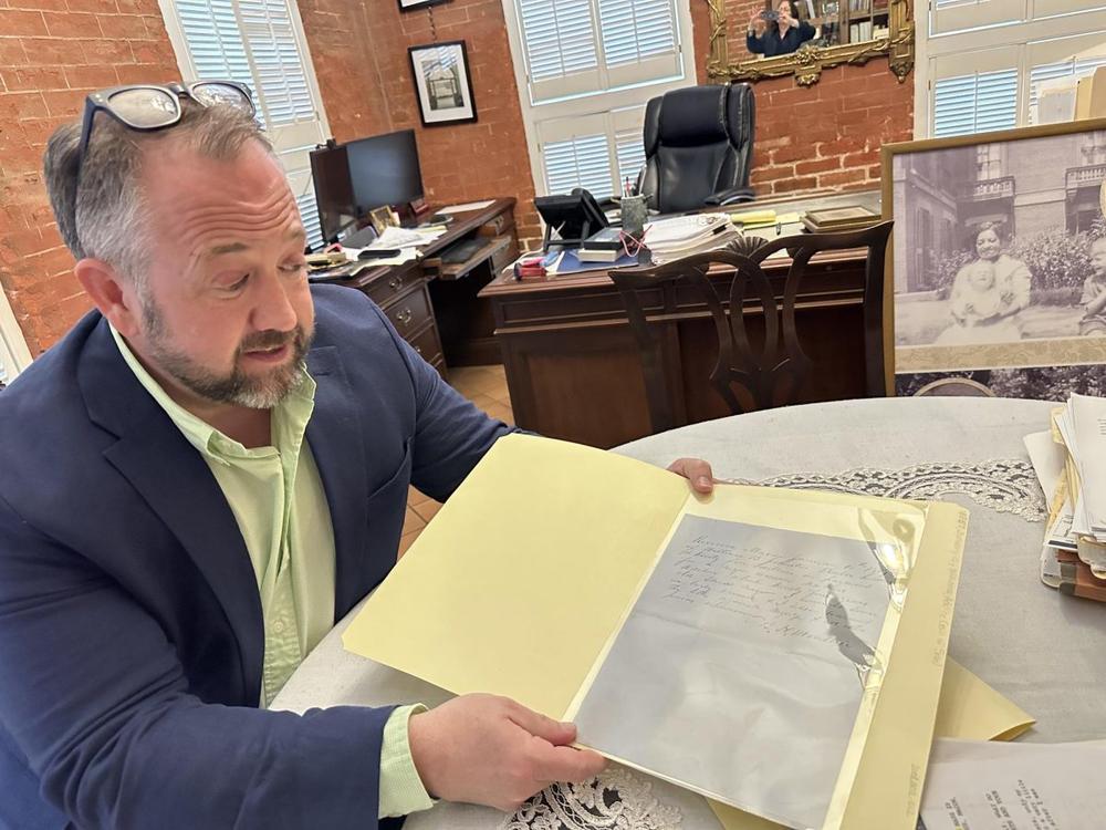 A bill of sale shows the Johnston family purchased Adeline Hall in 1857 when the Hay House was under construction. (Liz Fabian)