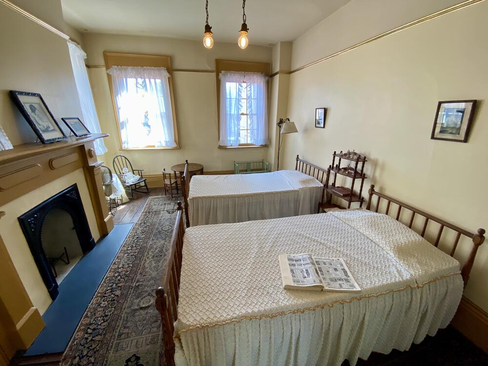 Flannery O'Connor's childhood bedroom. The beds were originally those of her parents, as married couples often slept separately.