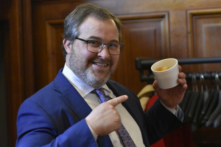 Rep. Kasey Carpenter celebrates with a bowl of cornbread and pinto beans after the House passed his bill to make cornbread Georgia’s official state bread. Ross Williams/Georgia Recorder (2024 file photo)