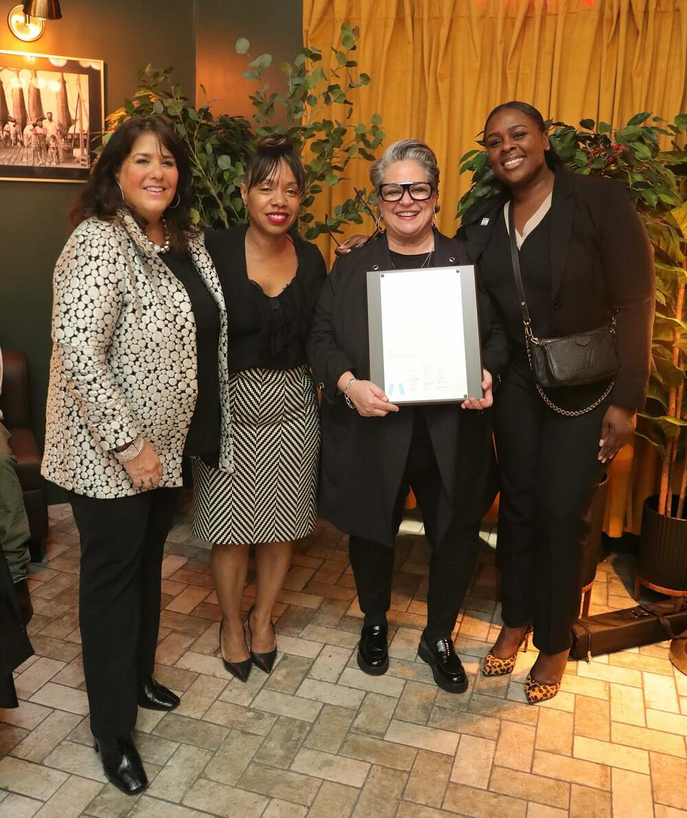 From left: Weny Cross, Philana Williams, Tammy Hurt (holding proclamation ) and Eshé Collins in Atlanta on April 2, 2025.